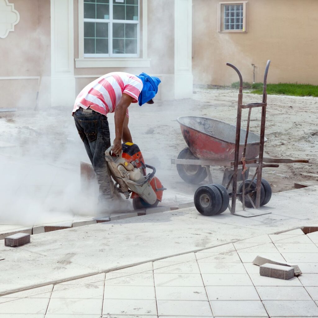 Paver installation being repaired with a paver saw